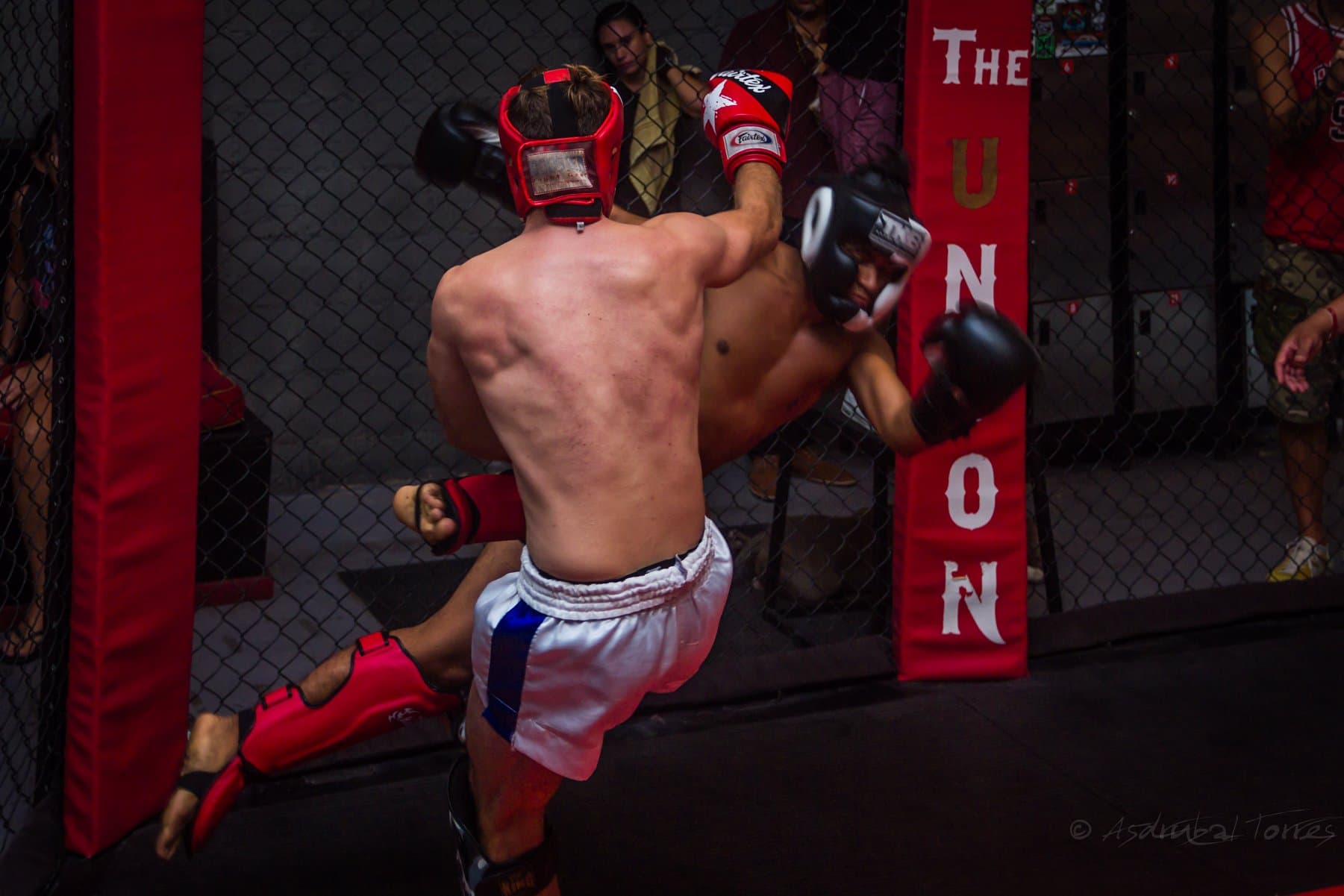 Front sweep technique demonstration at The Union Muay Thai & Boxing Gym, showcasing authentic Golden Era Muay Thai fighting techniques